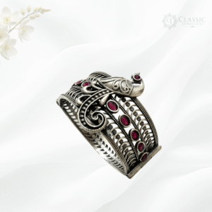 Silver peacock cuff with pink stones