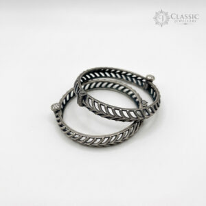 Two textured silver bangles