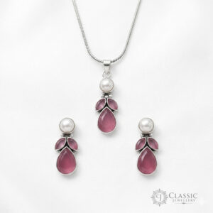 Elegant silver pendant necklace and matching earrings featuring purple amethyst-colored teardrop stones and pearls by Classicjewellery