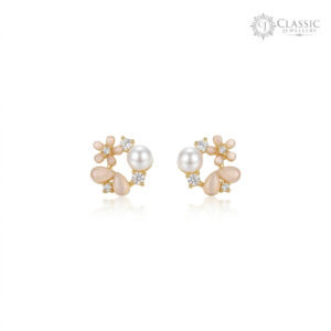 Exquisite gold-plated floral stud earrings for women featuring a large central white pearl, soft peach-pink resin flower petals, and sparkling cubic zirconia crystal clusters in a circular wreath design.