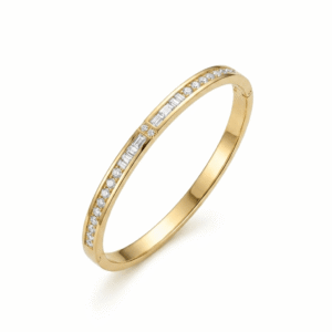 A sleek, polished yellow gold hinged bangle bracelet featuring a central channel of rectangular baguette-cut diamonds, flanked on both sides by rows of round brilliant-cut pave diamonds on a plain white background.