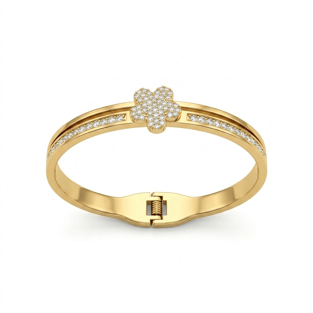 A polished gold split-band bangle bracelet featuring a central five-petal flower motif encrusted with micro-pave diamonds and diamond-lined shoulders