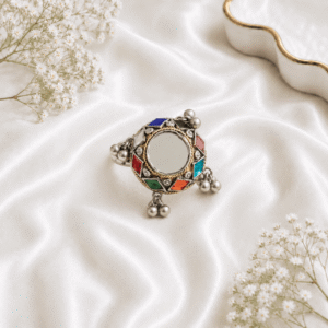 Traditional oxidized German silver adjustable mirror ring featuring multicolor stones and ghungroo charms for women.