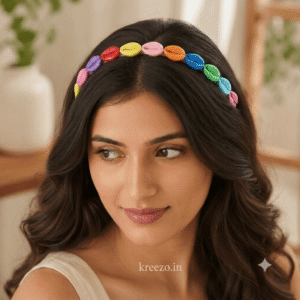 Woman wearing a multicolor seashell hair band with vibrant shell embellishments, fashionable headband for women and girls.