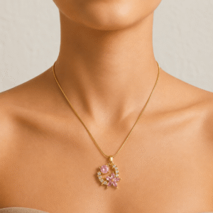Gold plated pink crystal floral moon pendant necklace with stainless steel chain worn by a female model.