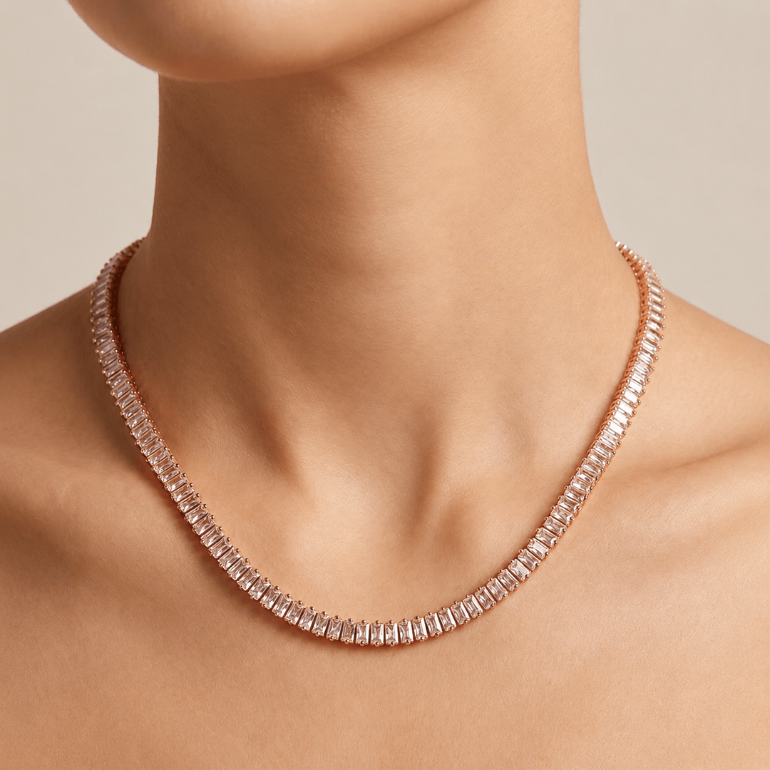Rose gold anti-tarnish necklace with baguette-style stones worn on neck