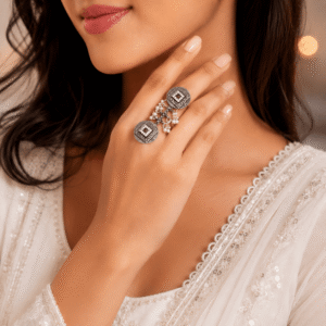 silver adjustable statement finger ring with pearl chain and ruby stone for women