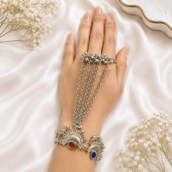 Oxidised silver multi-chain haath phool with red and blue stone detailing