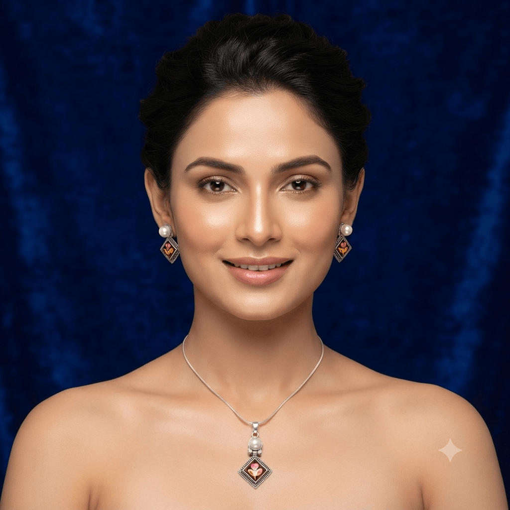 Woman wearing a premium silver finish floral pendant necklace with matching pearl stud earrings featuring a pink floral design.