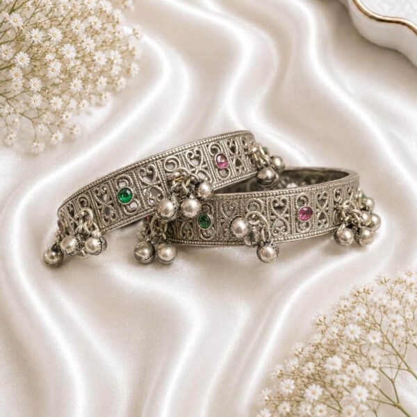 German silver kada pair with multicolor stones, intricate traditional design and hanging silver ghungroo beads