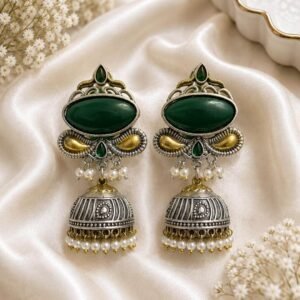 German silver green stone jhumka earrings with pearl beads and traditional oxidized detailing