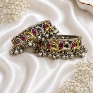 German silver peacock kada pair with pink stones, gold and silver peacock motifs and hanging ghungroo beads