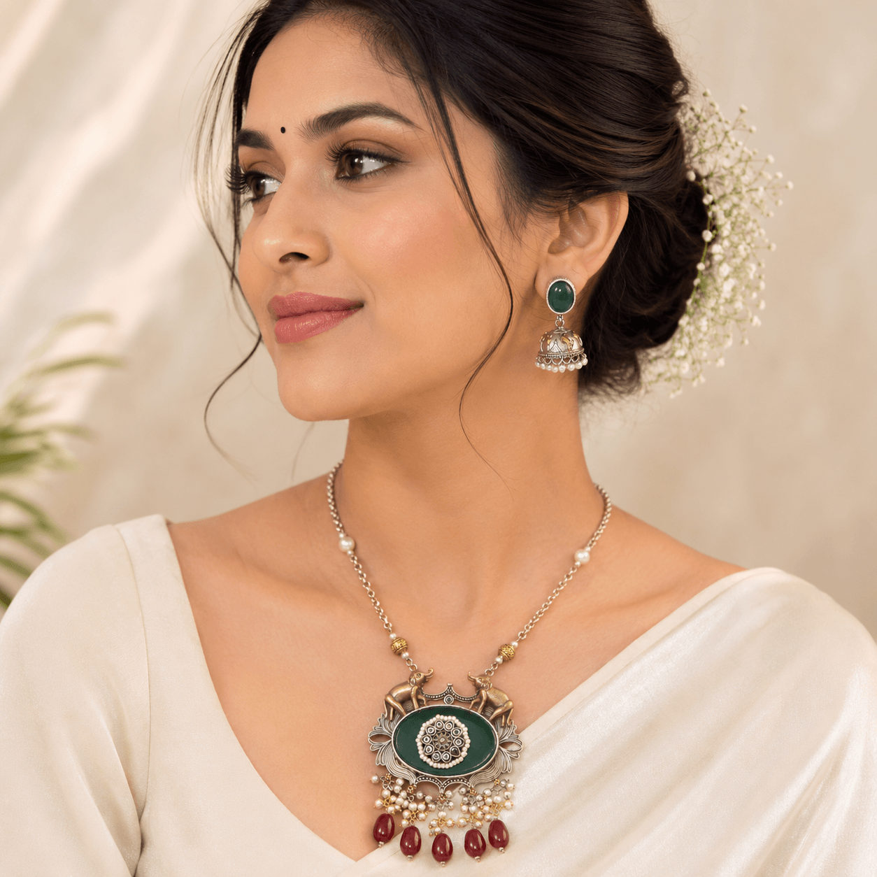 Green stone oxidised silver necklace with pearl and maroon bead detailing with matching jhumka earrings