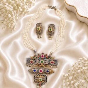 Multi-strand white pearl necklace with oxidized pendant and matching earrings featuring green, pink and blue stones