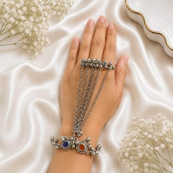 Oxidised silver multi-chain haath phool with red and green stone detailing