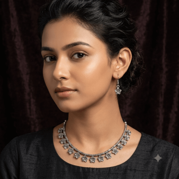 Young girl wearing leaf design silver necklace with matching leaf earrings