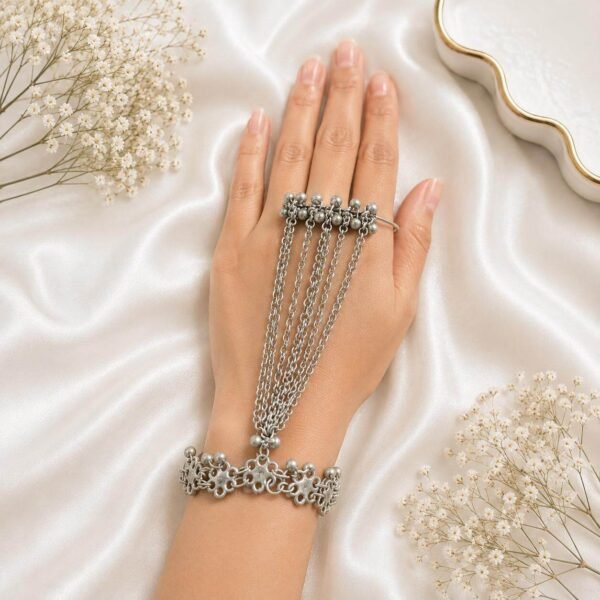 Oxidised silver multi-chain haath phool with flower design detailing