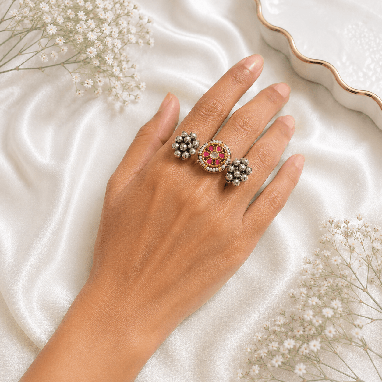 silver ring with pink floral stone