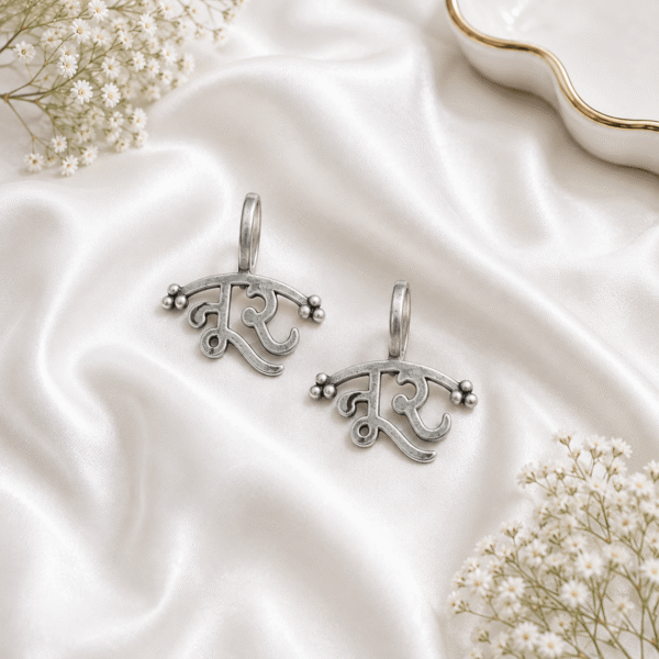 Silver traditional Gujarati bugadi earrings with curved design
